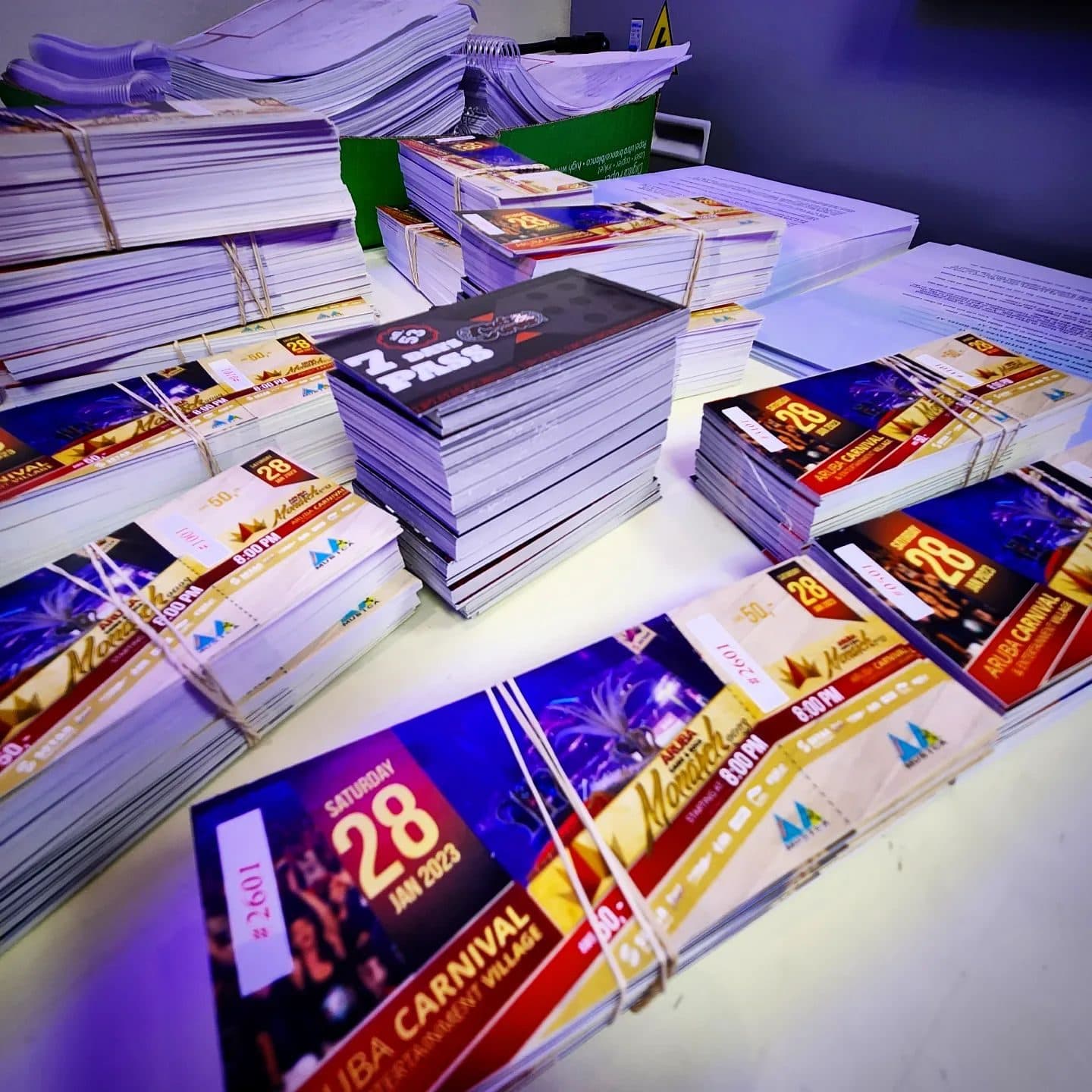 Stacks of freshly printed carnival magazines