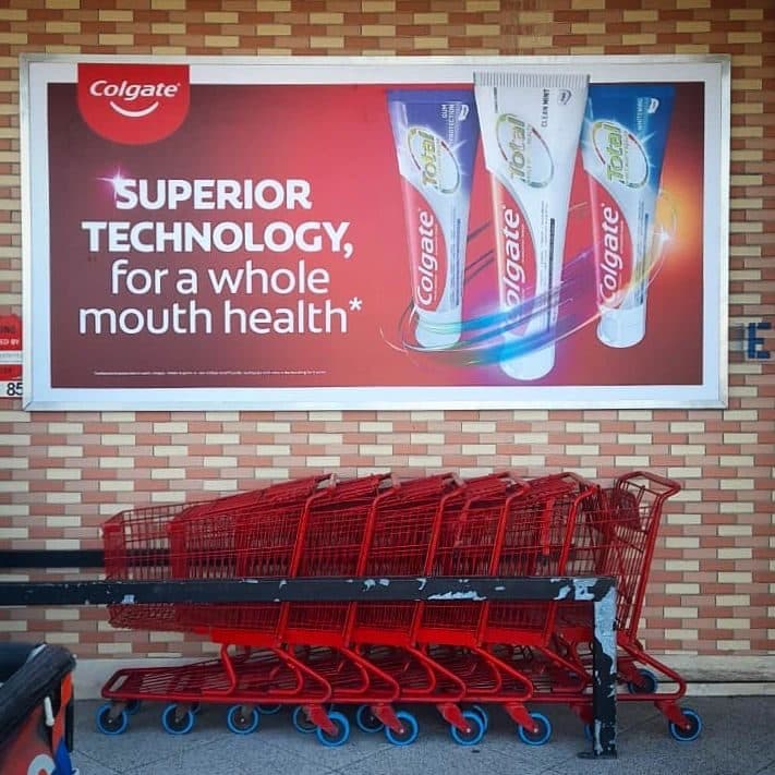 Colgate billboard printed and installed on a wall